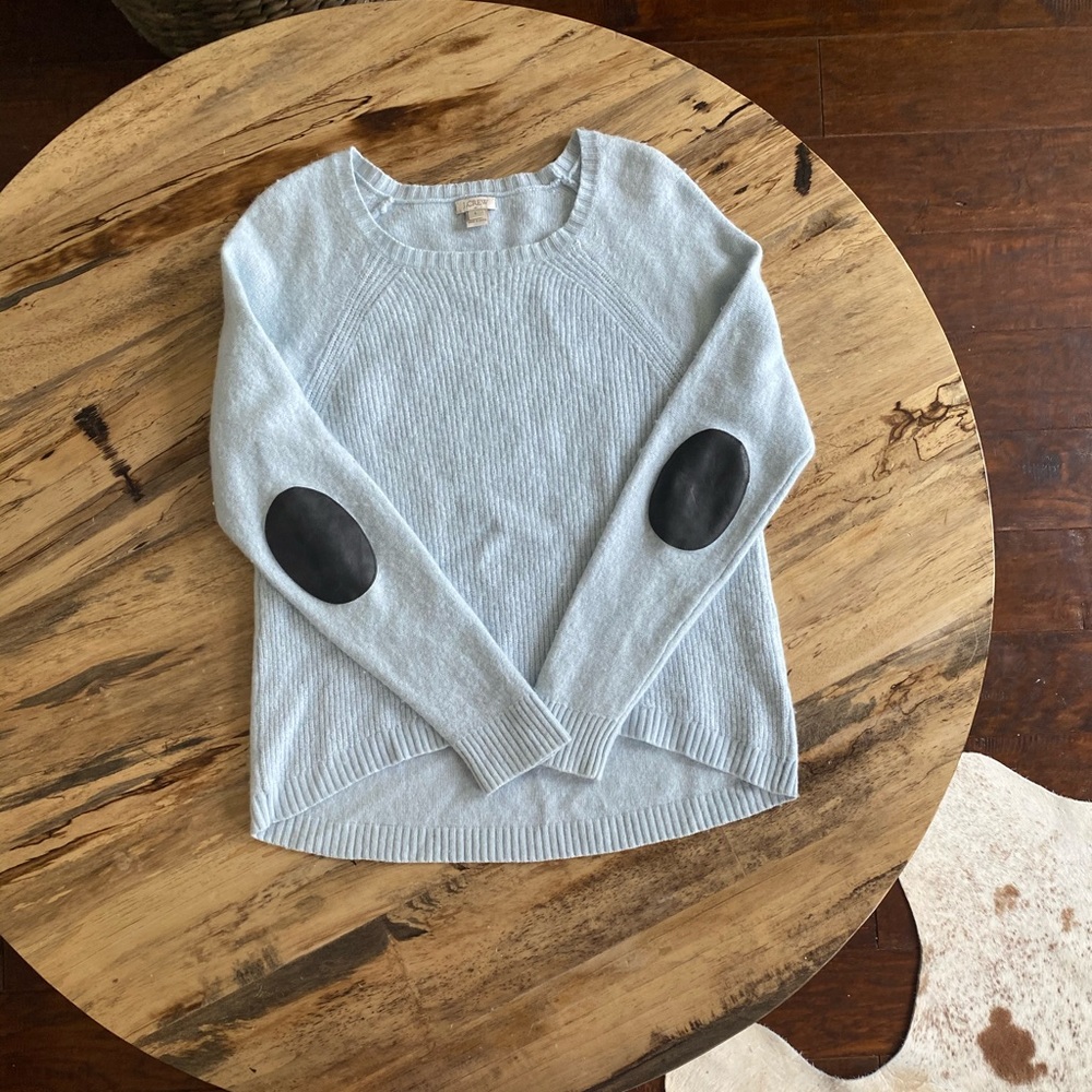 High low J-Crew baby blue sweater with leather elbow pads. Worn once!